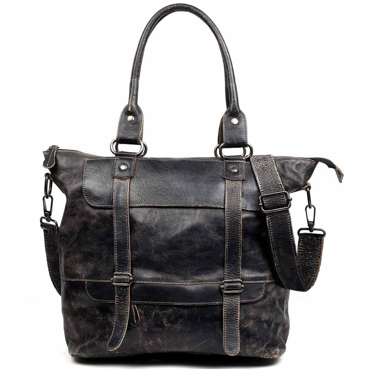The Big Fork by Bed Stu is a black leather tote bag featuring two handles, front straps, and an adjustable crossbody strap. Meticulously crafted from full grain leather, the bag boasts a weathered look complemented by metal buckle accents.