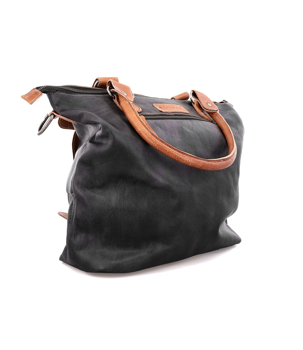 A Big Fork handbag by Bed Stu with tan handles.
