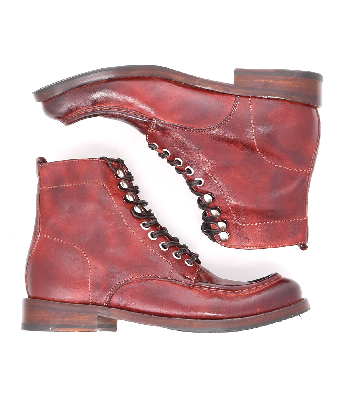 A pair of Blimey boots by Bed Stu, in red leather, on a white background, featuring the trendy combination of leather and boots.