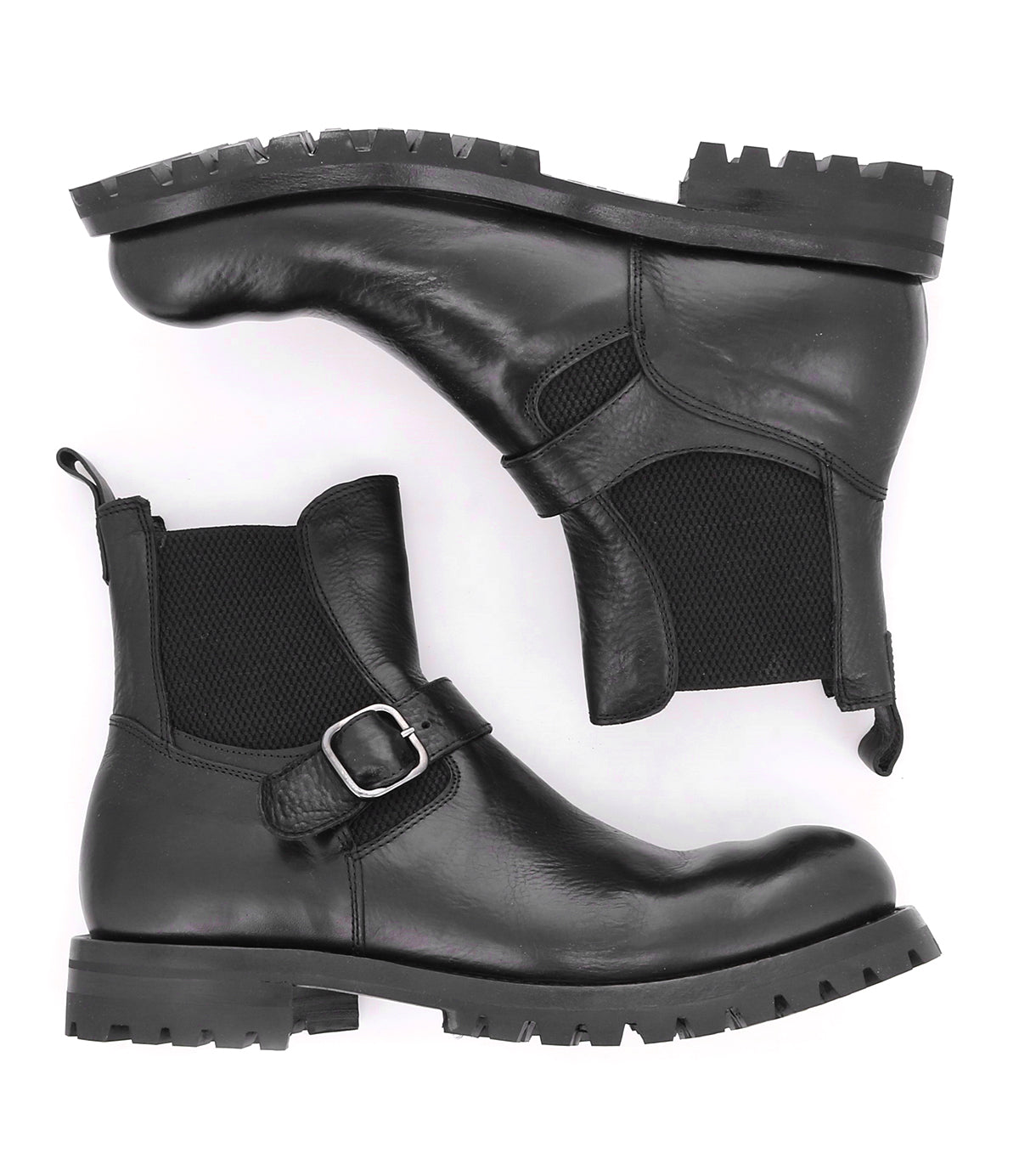 A pair of sleek black leather Bed Stu Chelsea boots with buckles.
