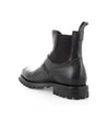 A sleek black leather Bed Stu Chelsea boot on a white background.