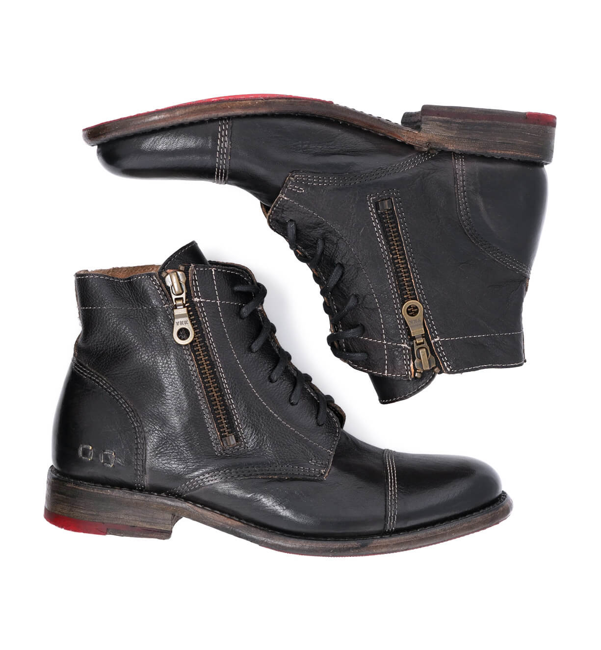 A pair of Bonnie lace-up combat ankle boots with red soles from Bed Stu.