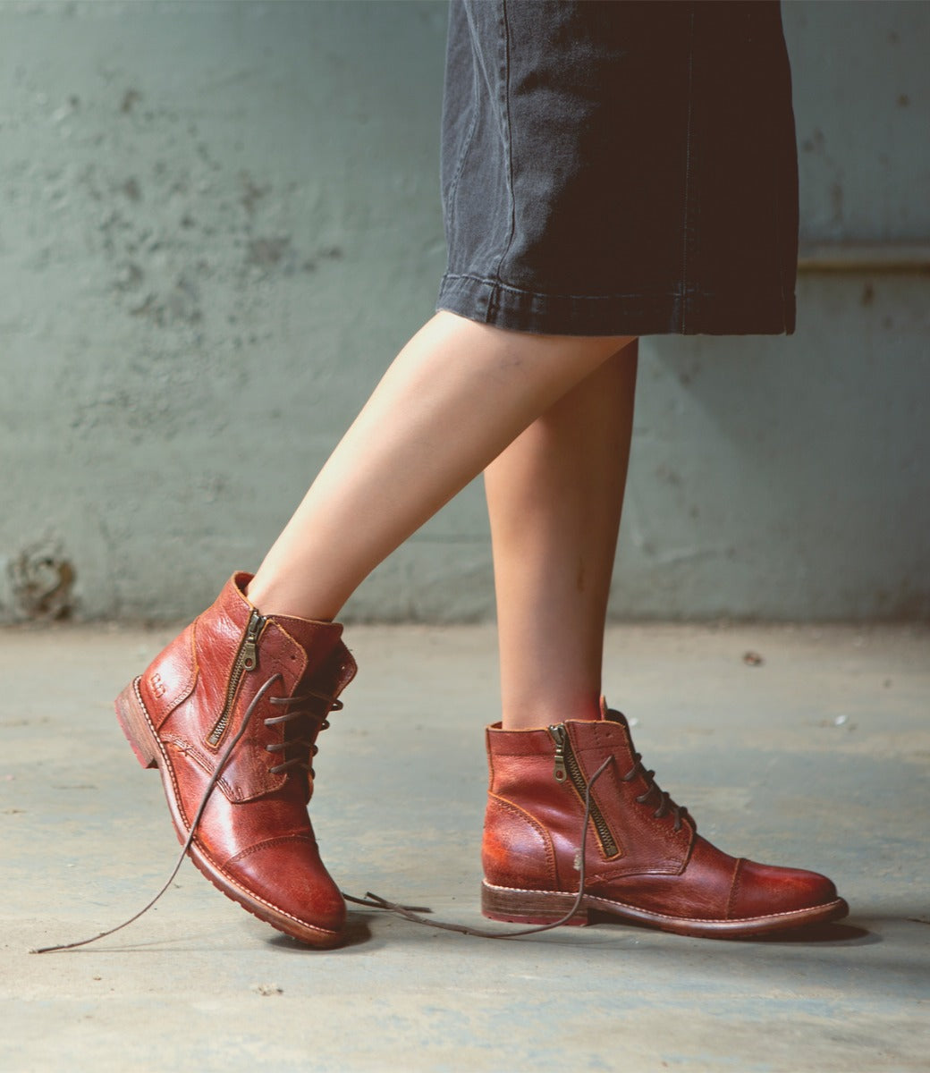 A woman wearing red leather Bonnie II boots by Bed Stu.