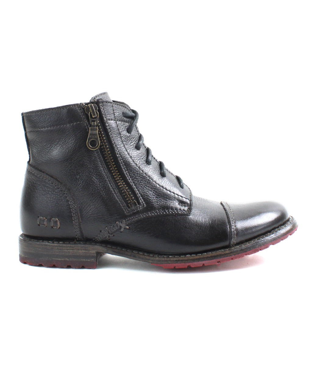 A women's Bonnie II by Bed Stu black leather boot with a zipper on the side.