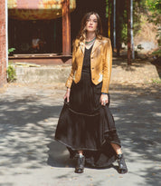 A woman wearing Bonnie II black boots from Bed Stu.