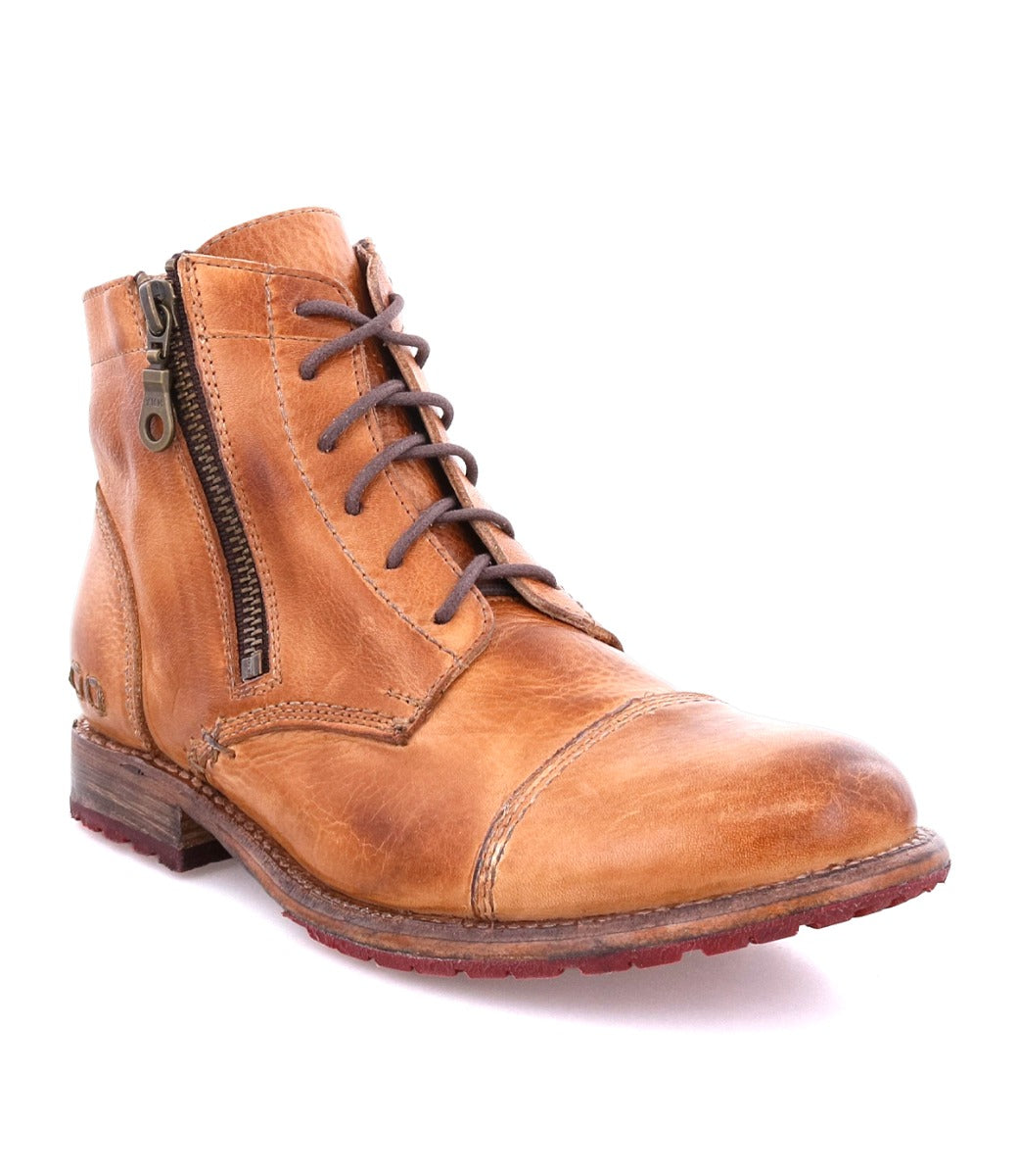 A Bonnie II Boot by Bed Stu, a tan leather boot with a zipper on the side.