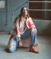 A woman wearing a pair of Bed Stu Bonnie II tan boots.