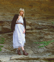 A woman in a white dress wearing the Bonnie II by Bed Stu.