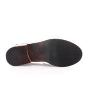 A pair of Bed Stu Italian leather penny loafers with a distressed finish on a white background.
