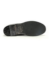 A black leather Bradley shoe with a black Bed Stu sole.
