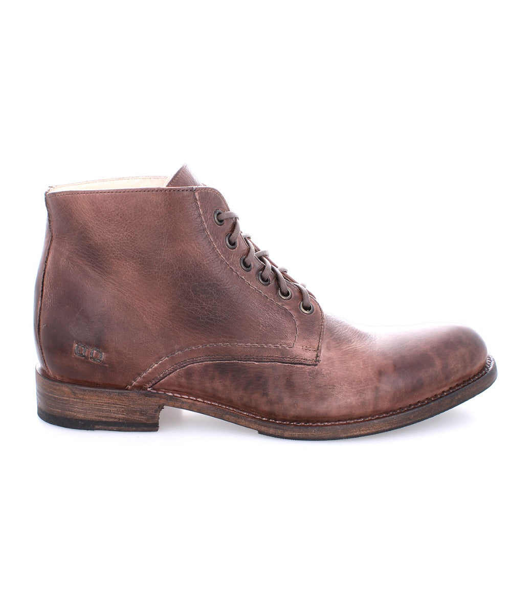 A single Bed Stu Bradley Black Rustic boot with laces on a white background.