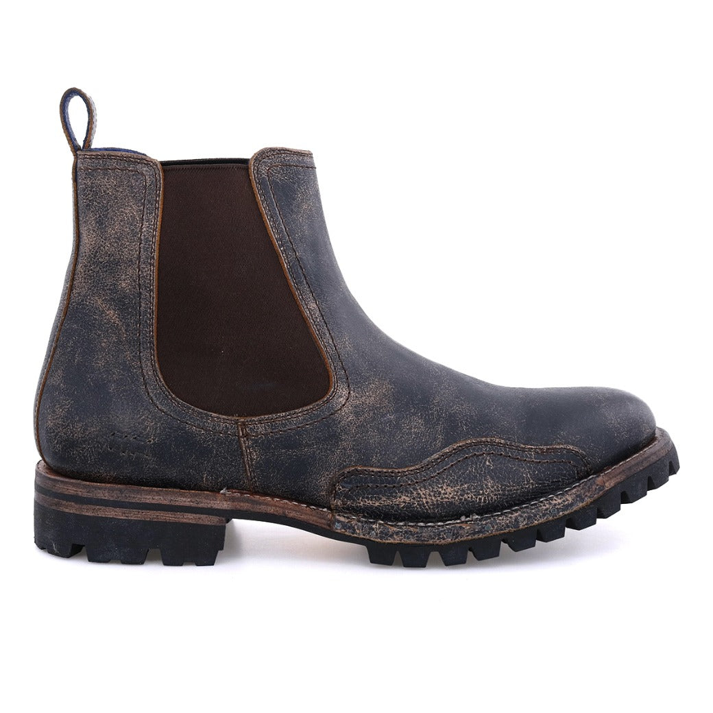 Side view of a distressed leather Bed Stu Brady Trek Chelsea boot with elastic side panels and a Vibram outsole, isolated on a white background.