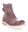 A brown leather ankle boot with a white sole named Brianna by Bed Stu.