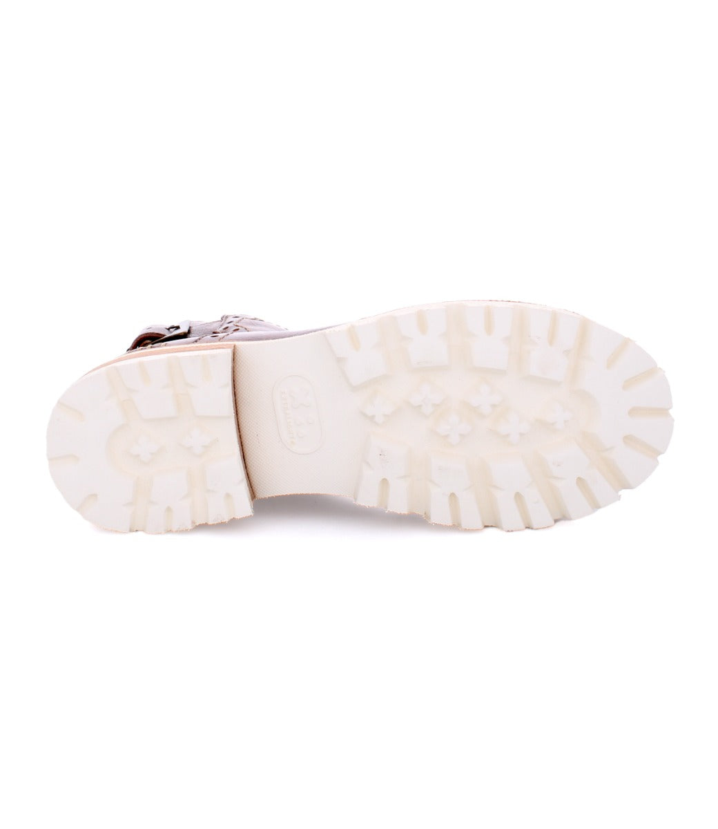 A pair of Bed Stu Brianna women's shoes with white soles on a white background.