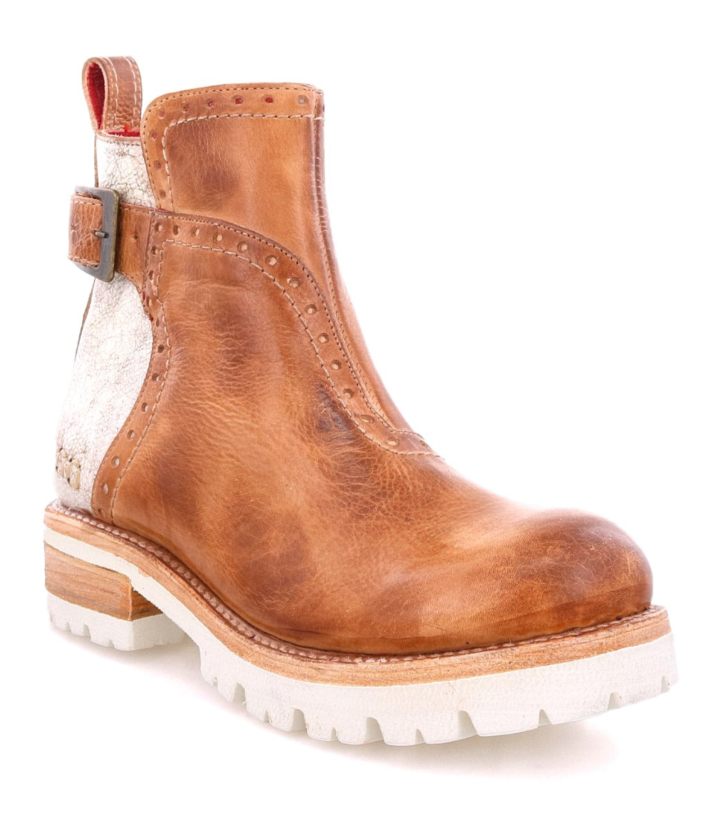 A women's Brianna tan leather ankle boot with a white sole by Bed Stu.