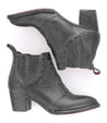 A pair of Bed Stu Brie II black leather ankle boots on a white background.