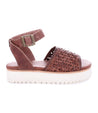 A Brisa women's brown sandal with woven straps and a white sole by Bed Stu.