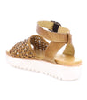 A women's Brisa sandal by Bed Stu with a white sole.