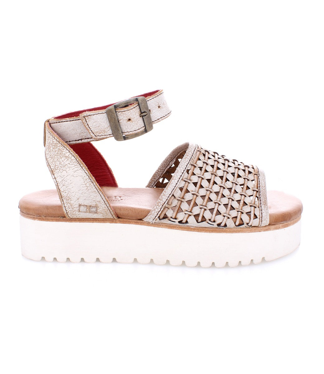 A women's Brisa platform sandal in gold with a white sole from the Bed Stu brand.