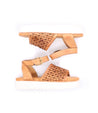 A pair of Brisa sandals from Bed Stu with a white sole.