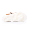 A pair of Bed Stu Brisa women's sandals with a white sole.