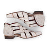 A pair of white Brittany sandals with straps on them by Bed Stu.