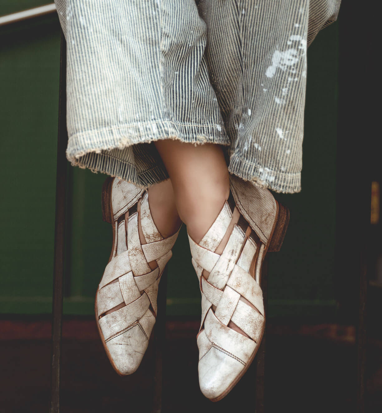 A woman's feet in a pair of Bed Stu Brittany shoes.