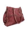 A burgundy Bed Stu Bruna vegetable tanned leather bag with straps.