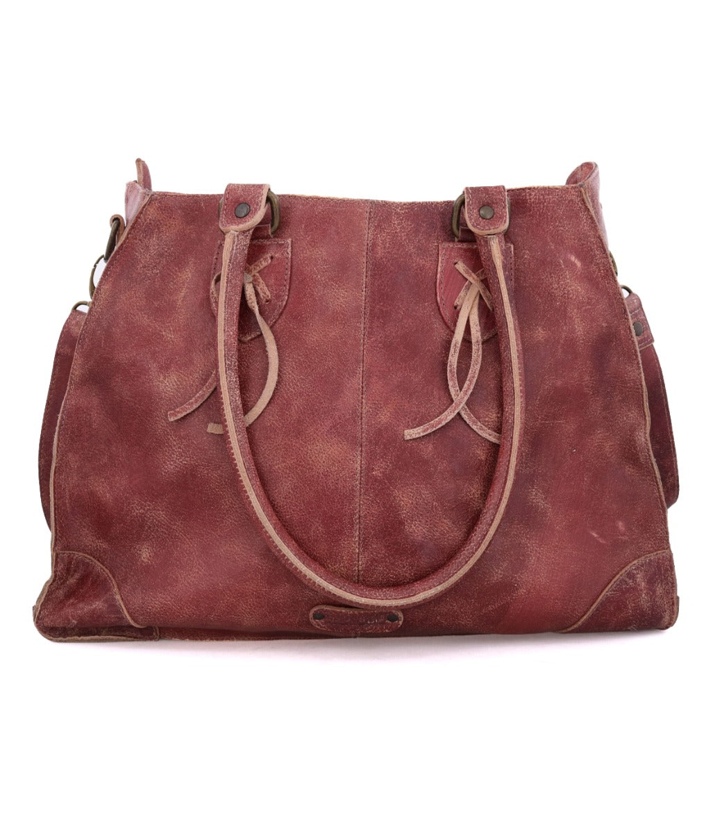 A red burgundy Stu Bruna pure leather bag with straps.