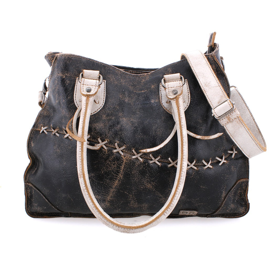 A black and white Bed Stu Bruna leather bag with straps.