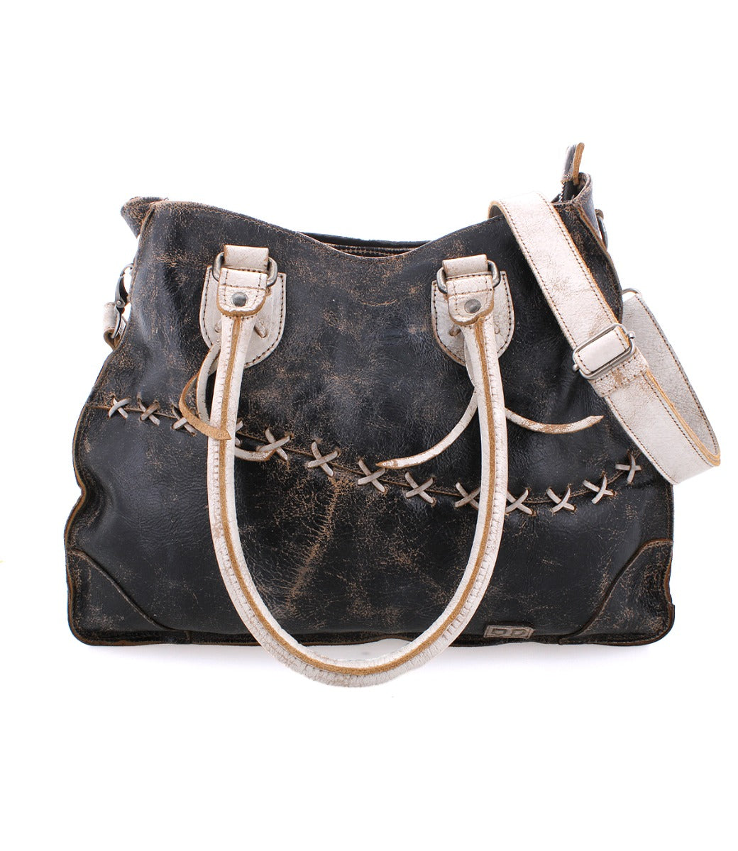 A black and white Bed Stu Bruna leather bag with straps.
