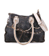 A black and white Bed Stu Bruna leather bag with straps.