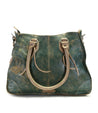 A teal Bed Stu Bruna vegetable tanned leather bag with straps.