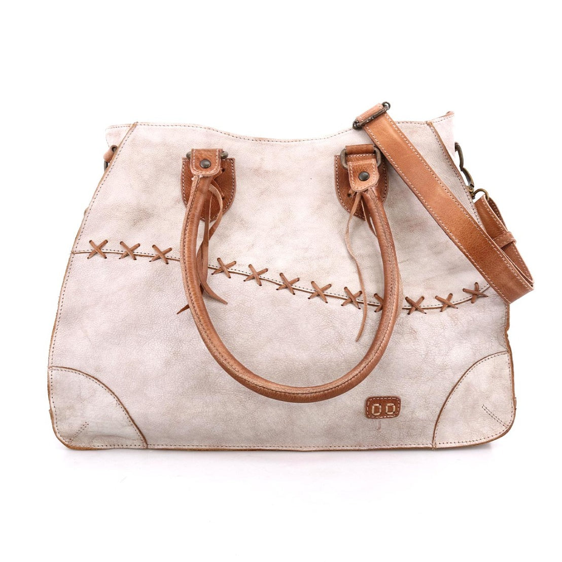A white and tan Bed Stu Bruna leather bag with straps.