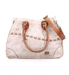 A white and tan Bed Stu Bruna leather bag with straps.