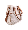 A white and tan Bed Stu Bruna pure leather bag with straps.