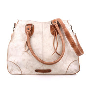 A white and tan Bed Stu Bruna vegetable tanned leather bag with straps.