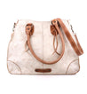 A white and tan Bed Stu Bruna vegetable tanned leather bag with straps.
