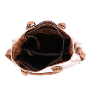 Inside of a white and tan Bed Stu Bruna leather bag.