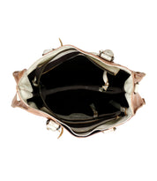 The interior of a stylish Bruna leather bag with shoulder straps, featuring a zipper closure by Bed Stu.