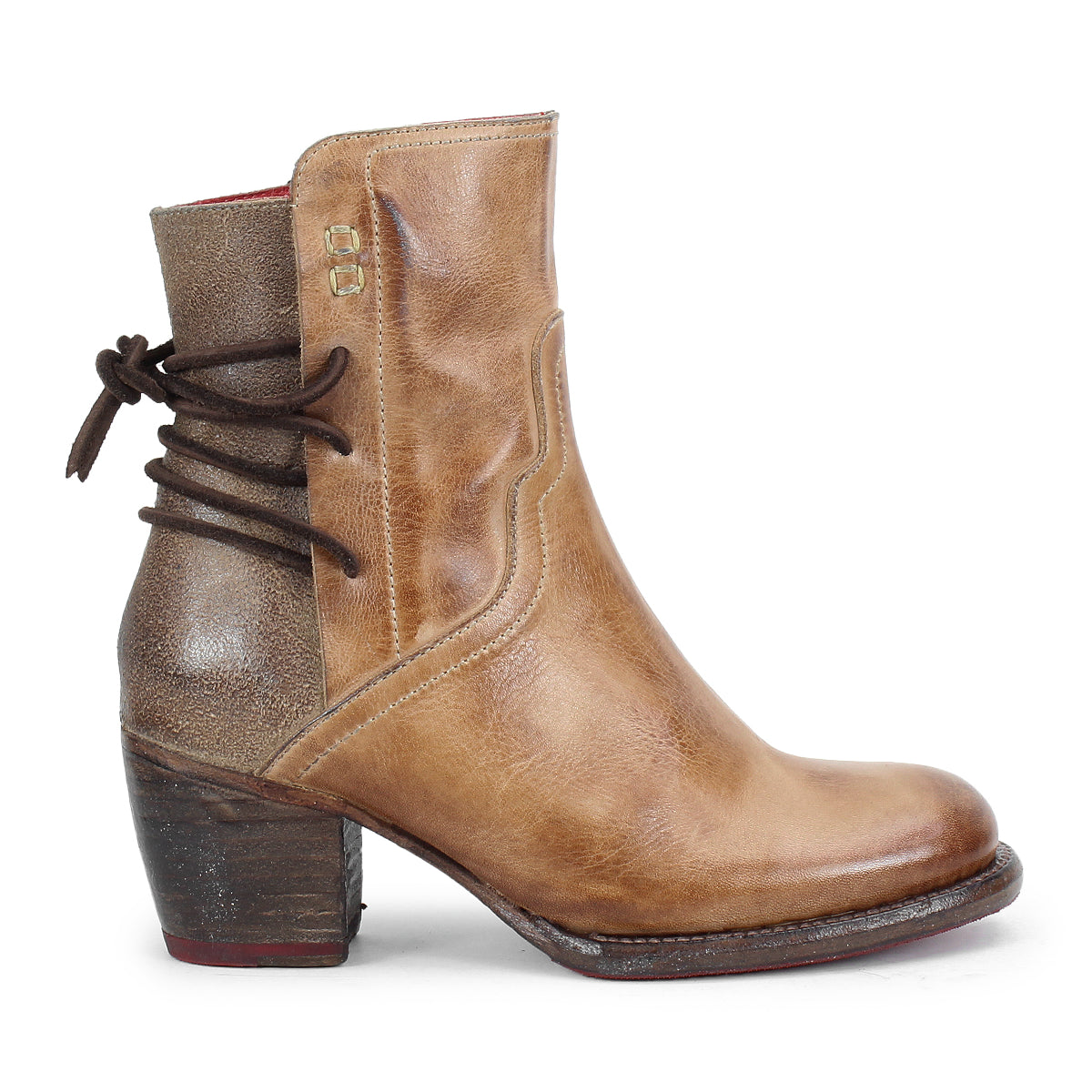 The Cable boot by Bed Stu is a brown, hand-finished leather mid-ankle style with a stacked heel, decorative stitching, and dark laces wrapping the back for Western flair.