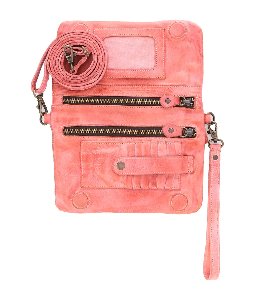 Inside a Cadence pink leather clutch bag by Bed Stu.
