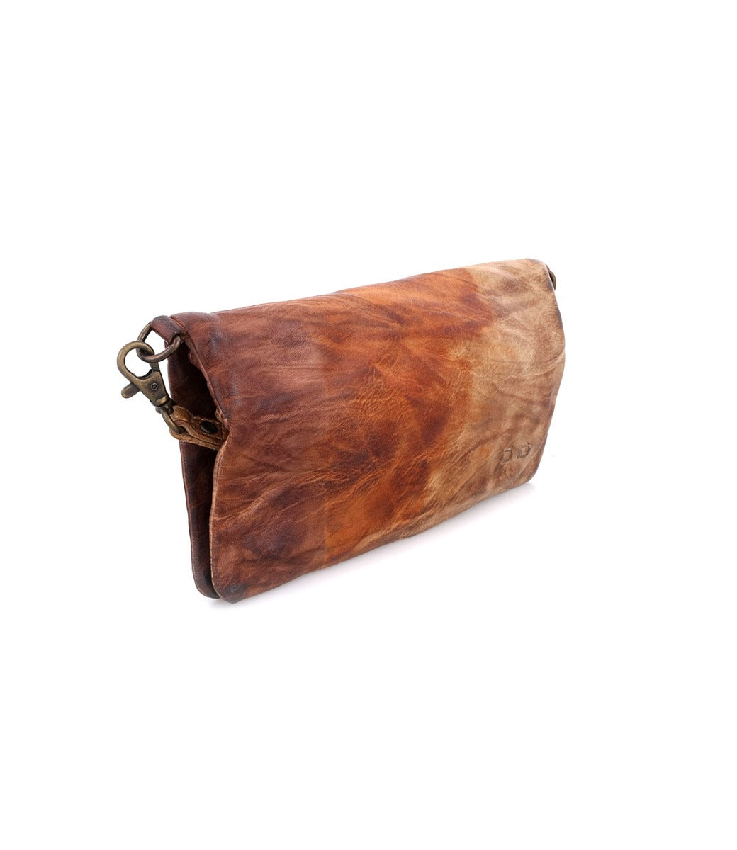 A Cadence brown leather clutch bag.