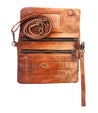 Inside a Cadence brown leather clutch bag by Bed Stu.