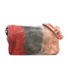A Cadence cross body bag by Bed Stu with a multi color dye.