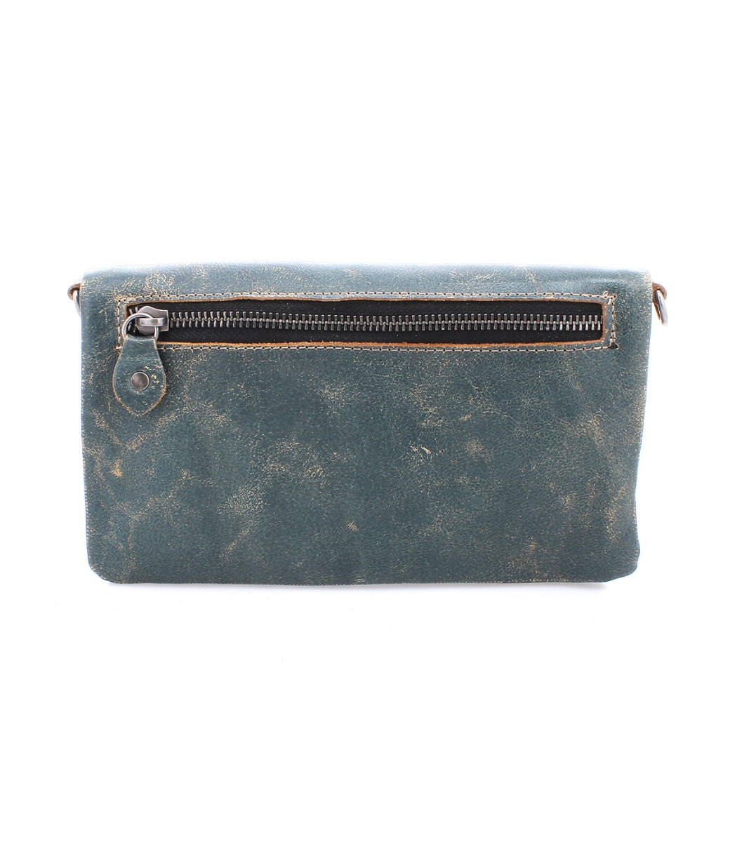 A Cadence by Bed Stu blue leather clutch with a zipper.