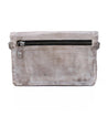 A grey leather Cadence clutch bag with a zipper by Bed Stu.