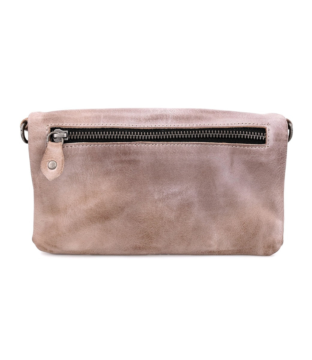 A pink leather Cadence clutch bag with a zipper from Bed Stu.