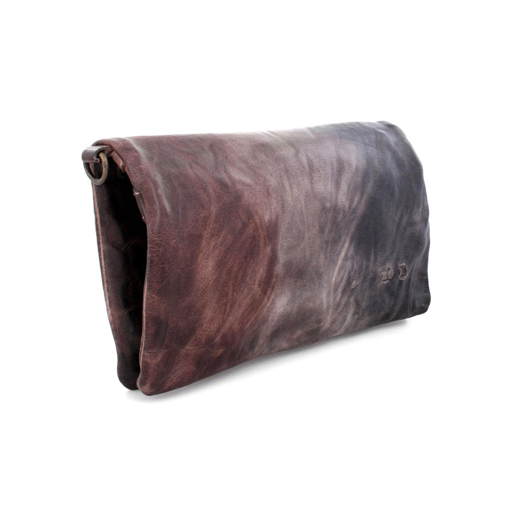 A brown and black Cadence leather clutch bag by Bed Stu.