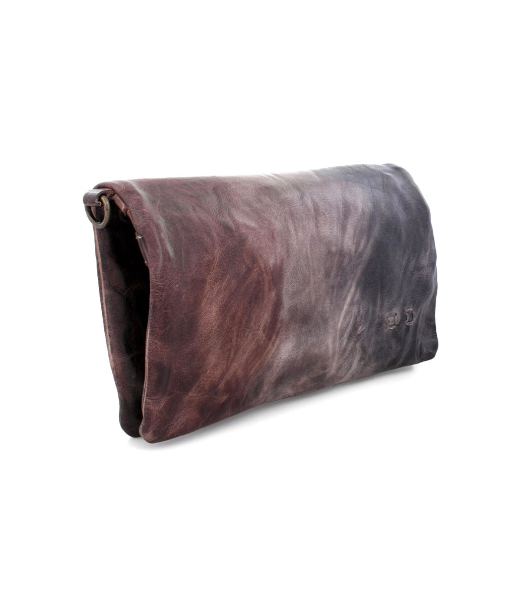 A brown and black Cadence leather clutch bag by Bed Stu.